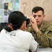 Soldier gives eye exam for IRT Mission