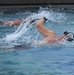 A competitor in the 2024 U.S. Army Special Operations Command (USASOC) Best Combat Diver Competition participates in a swimming race