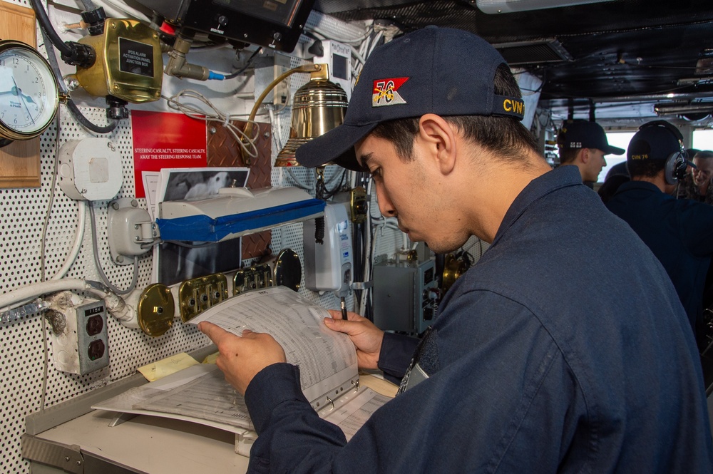 USS Ronald Reagan (CVN 76) Sailors stand watch  in the pilot house