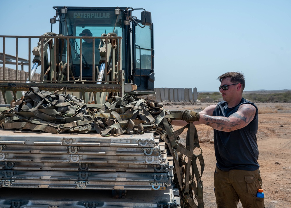 449th AEG air transportation specialists conduct aerial logistics