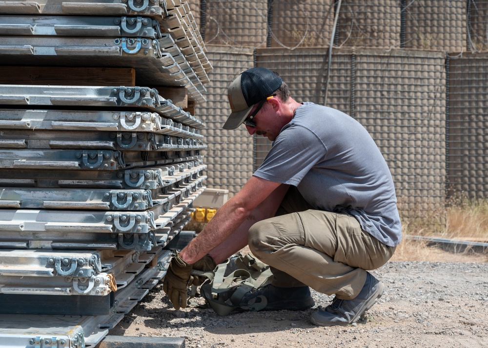449th AEG air transportation specialists conduct aerial logistics