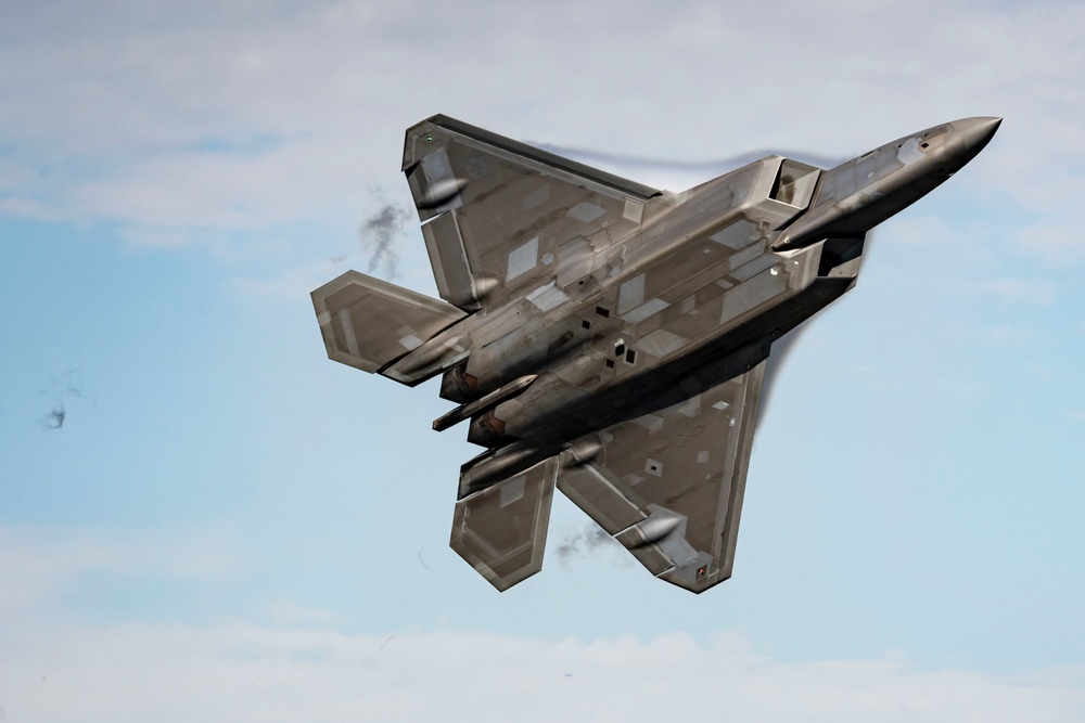 F-22 Raptors fly and train over JBER
