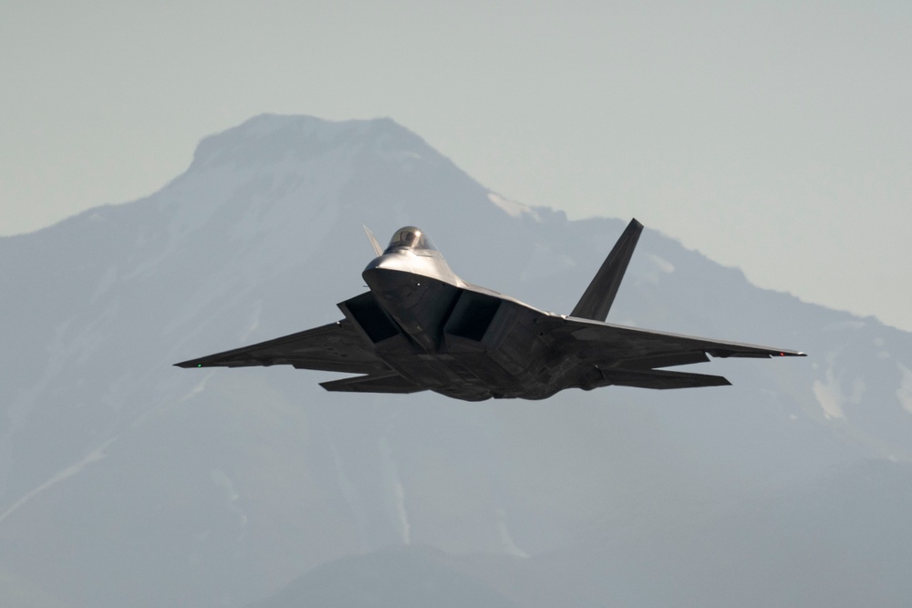 F-22 Raptors fly and train over JBER