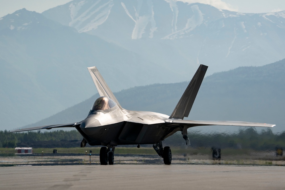 F-22 Raptors fly and train over JBER