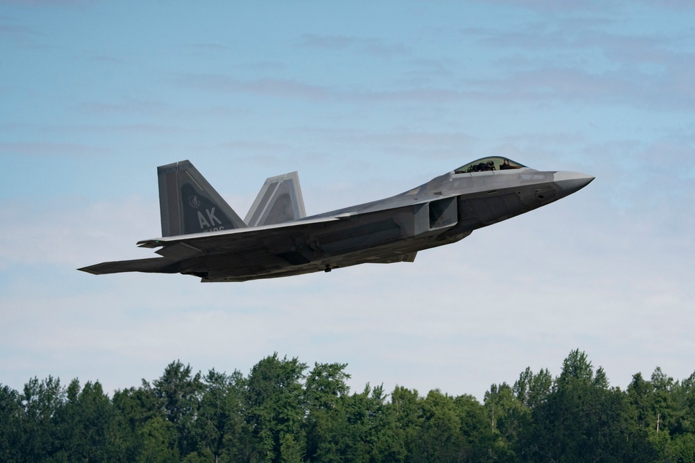 F-22 Raptors fly and train over JBER