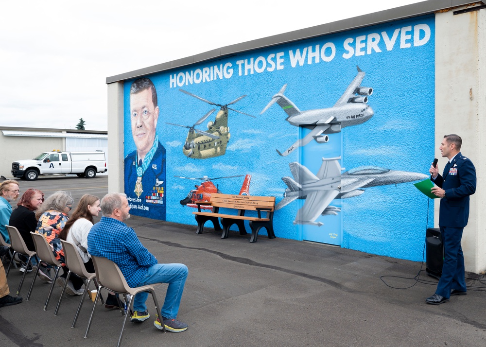 A tribute to service: Auburn Municipal Airport unveils Col. Joe Jackson mural, bench