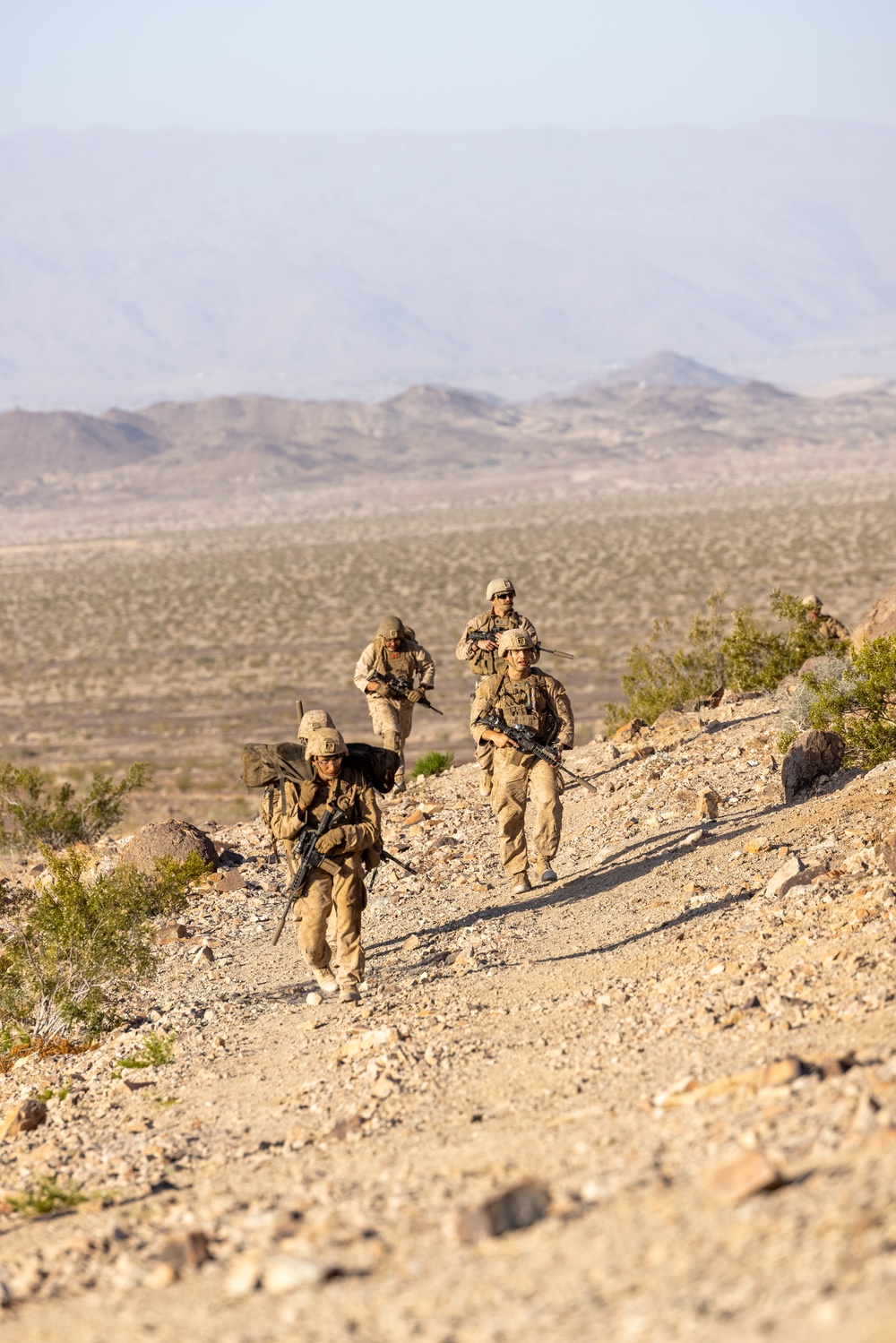 U.S. Marines with 2nd Battalion, 24th Marine Regiment, execute range 400