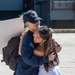 USS Ronald Reagan (CVN 76) Sailors greet family on the pier after arriving at Naval Base Guam for scheduled port visit