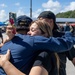 USS Ronald Reagan (CVN 76) Sailors greet family on the pier after arriving at Naval Base Guam for scheduled port visit