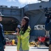 USS Ronald Reagan (CVN 76) Sailors greet family on the pier after arriving at Naval Base Guam for scheduled port visit