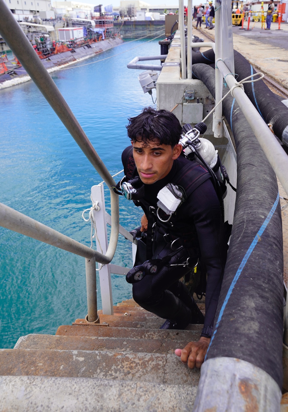 Navy Divers Assist Docking USS Colorado