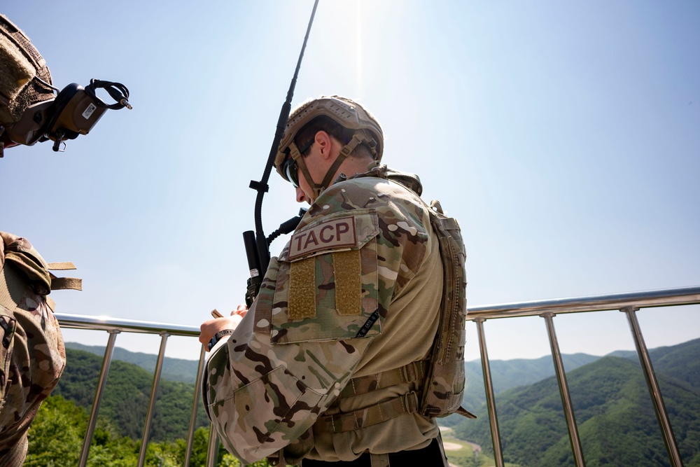 U.S. Special Operations personnel conduct live fire training with AC-130J gunship