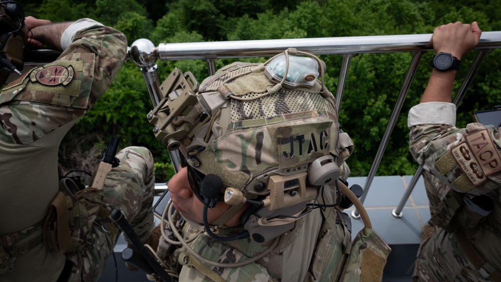 U.S. special operations personnel conduct routine live fire training with AC-130J gunship