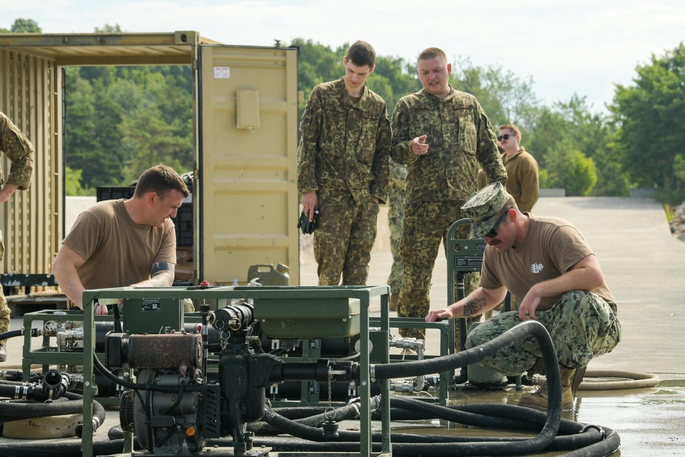 NMCB 11 teaches Latvian Engineers about Water Purification during BALTOPS 24