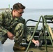 NMCB 11 teaches Latvian Engineers about Water Purification during BALTOPS 24