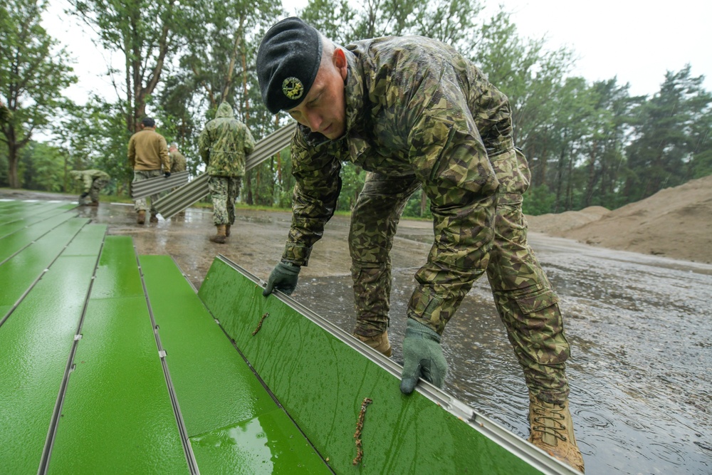 NMCB 11 Seabees and Latvian National Guard engineers collaborate for BALTOPS24