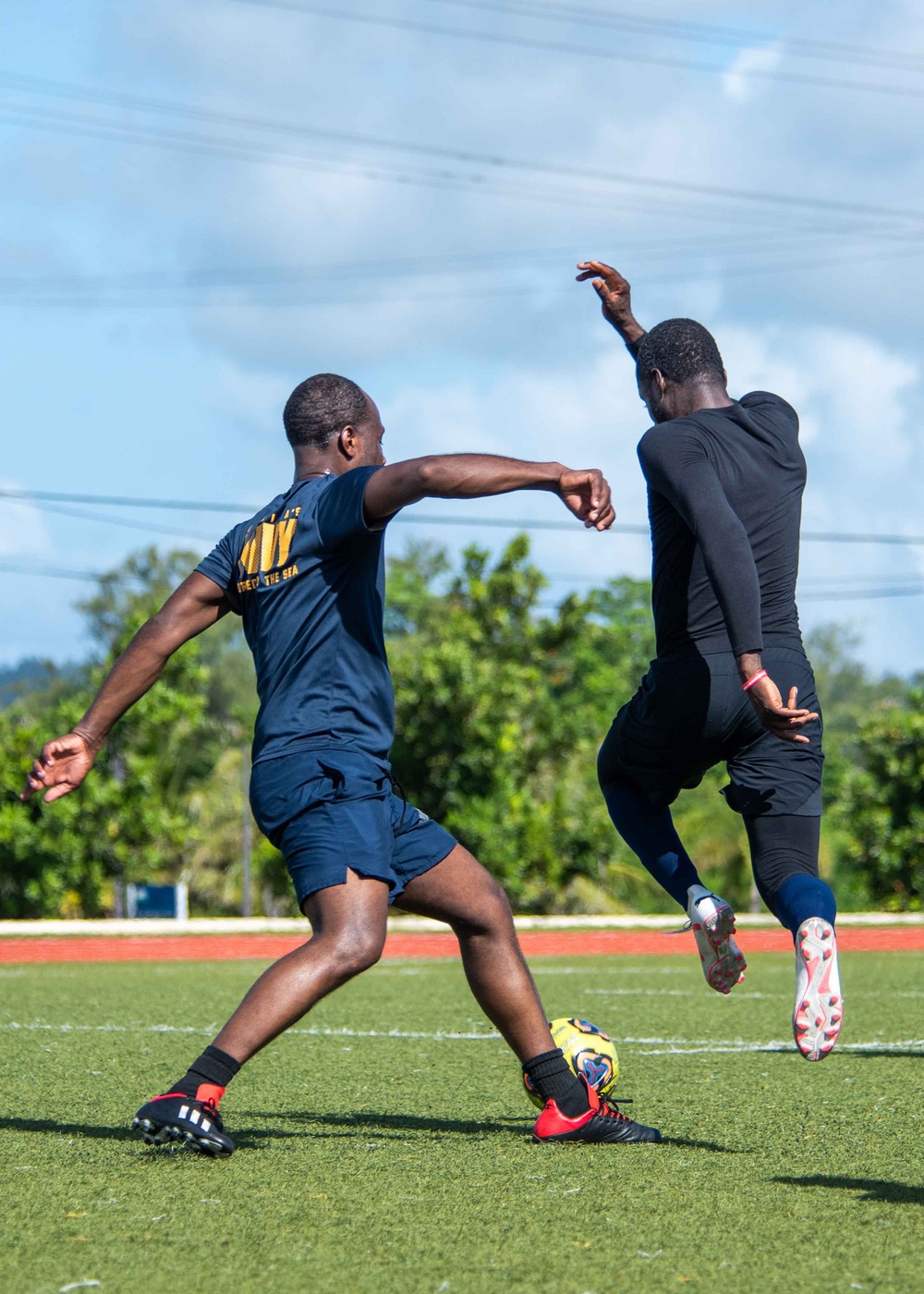 USS Ronald Reagan (CVN 76) Sailors play soccer in Guam