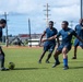USS Ronald Reagan (CVN 76) Sailors play soccer in Guam