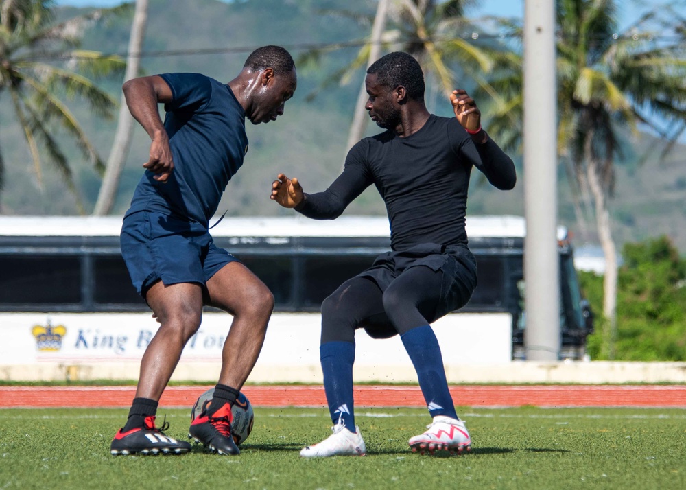 USS Ronald Reagan (CVN 76) Sailors play soccer in Guam