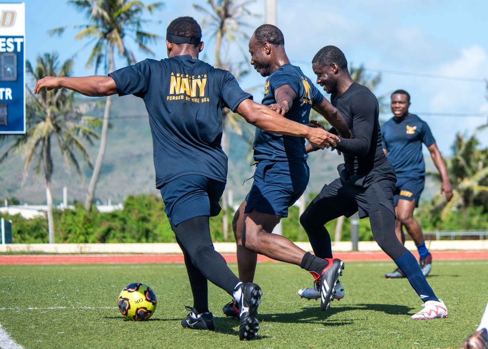 USS Ronald Reagan (CVN 76) Sailors play soccer in Guam