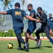 USS Ronald Reagan (CVN 76) Sailors play soccer in Guam