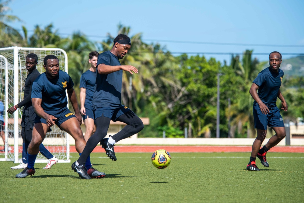 USS Ronald Reagan (CVN 76) Sailors play soccer in Guam