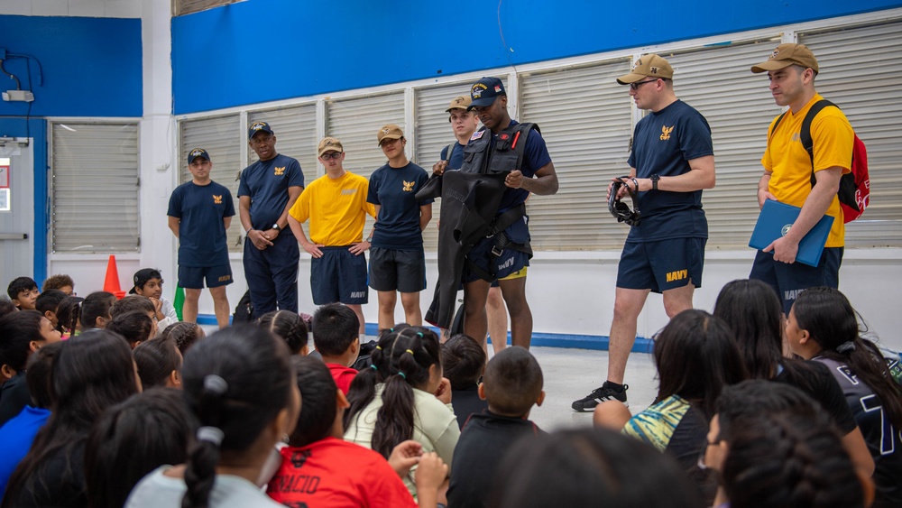 USS Ronald Reagan (CVN 76) Sailors and other Navy Sailors participate in a community relations event at Manuel Ulloa Lujan Elementary School