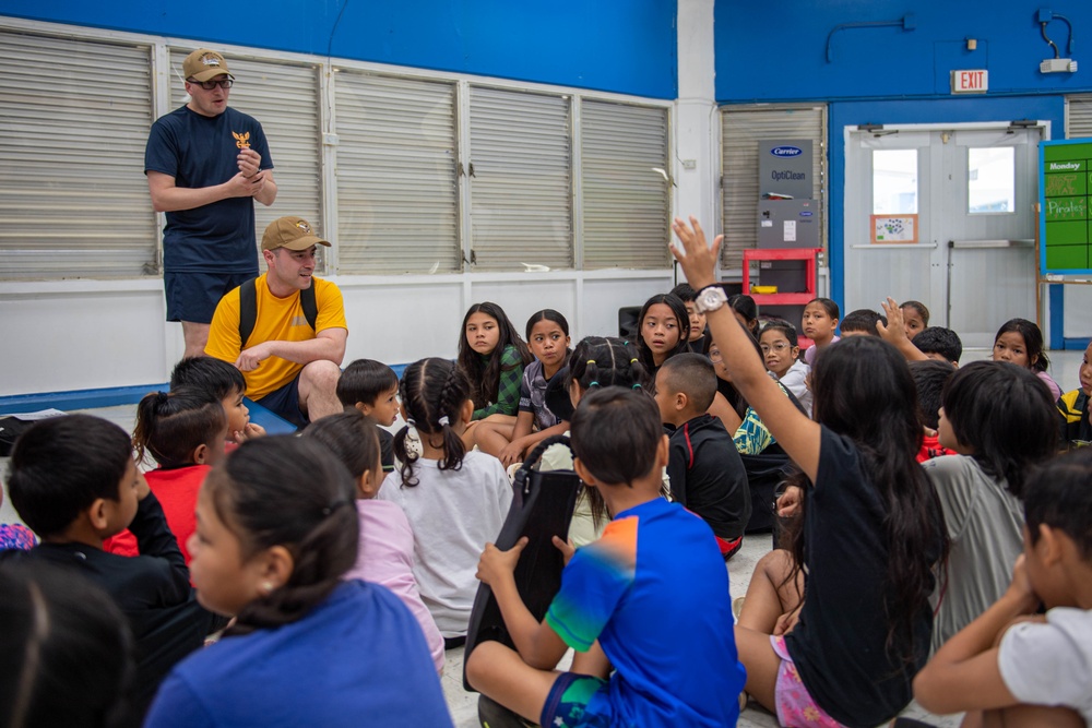USS Ronald Reagan (CVN 76) Sailors and other Navy Sailors participate in a community relations event at Manuel Ulloa Lujan Elementary School