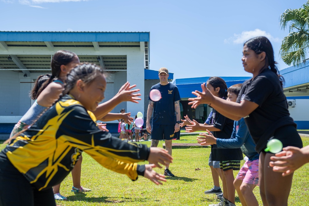 USS Ronald Reagan (CVN 76) Sailors and other Navy Sailors participate in a community relations event at Manuel Ulloa Lujan Elementary School