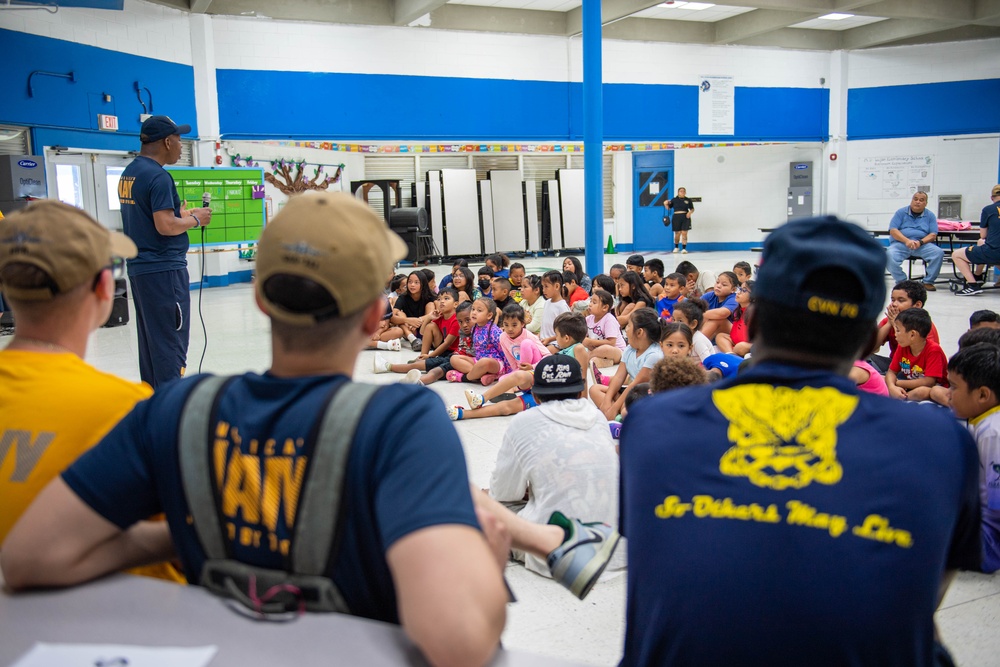 USS Ronald Reagan (CVN 76) Sailors and other Navy Sailors participate in a community relations event at Manuel Ulloa Lujan Elementary School