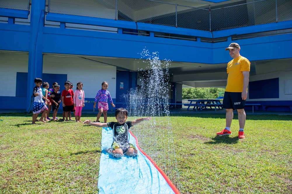 USS Ronald Reagan (CVN 76) Sailors and other Navy Sailors participate in a community relations event at Manuel Ulloa Lujan Elementary School