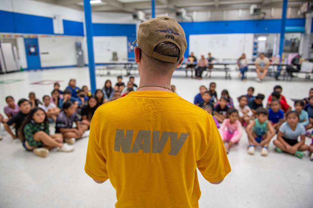 USS Ronald Reagan (CVN 76) Sailors and other Navy Sailors participate in a community relations event at Manuel Ulloa Lujan Elementary School