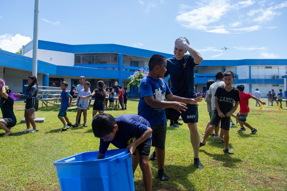 USS Ronald Reagan (CVN 76) Sailors and other Navy Sailors participate in a community relations event at Manuel Ulloa Lujan Elementary School