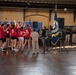 The Navy Band Cruisers entertain students in Dahlgren Hall at the United States Naval Academy.