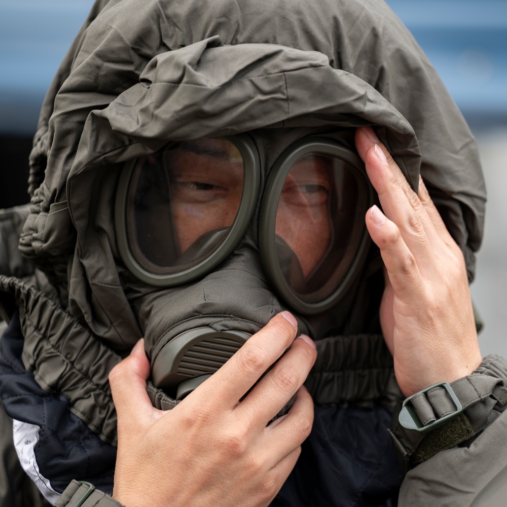 374th CES, Japan forces hone interoperability during CBRN training