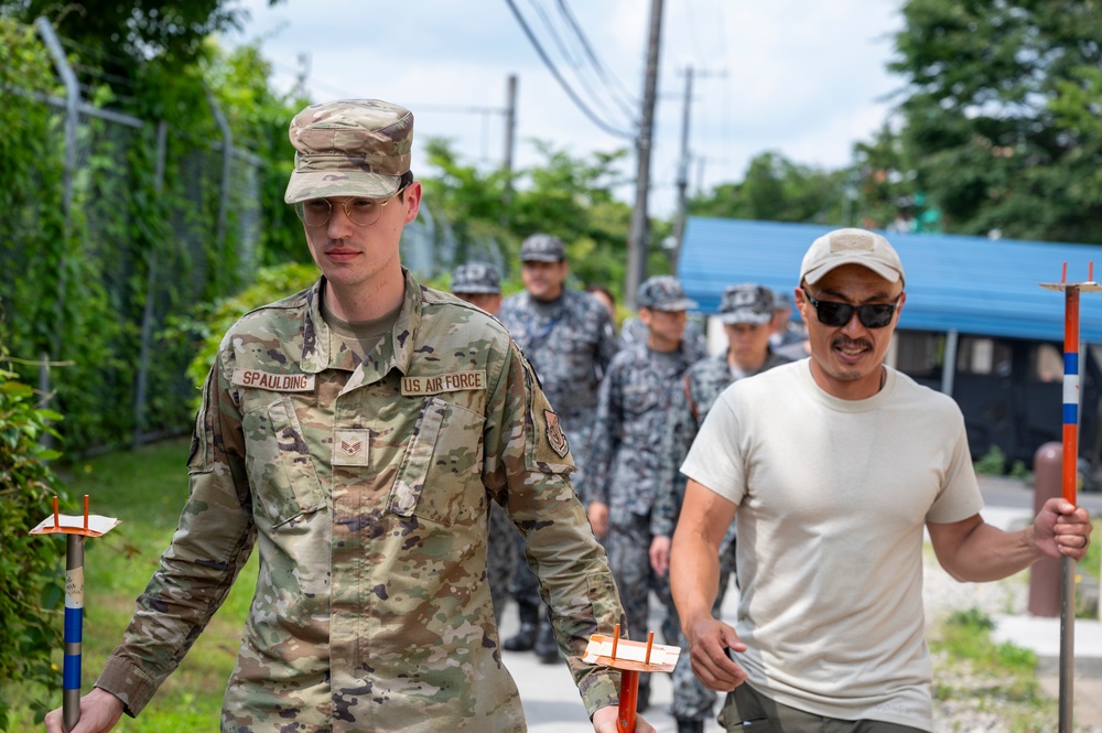 374th CES, Japan forces hone interoperability during CBRN training