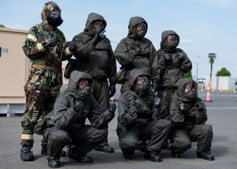 374th CES, Japan forces hone interoperability during CBRN training