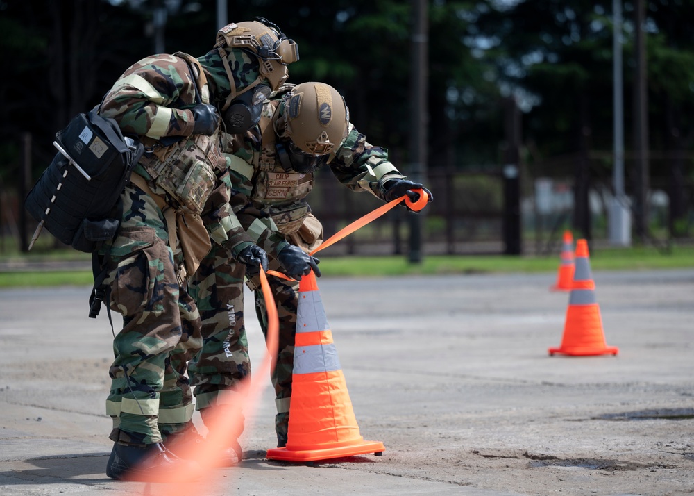 374th CES, Japan forces hone interoperability during CBRN training