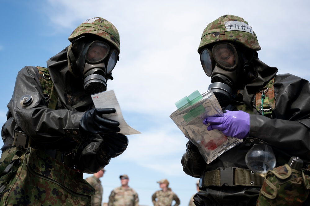 374th CES, Japan forces hone interoperability during CBRN training