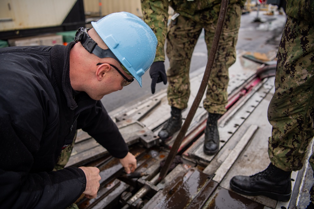 Sailor Works On Catapult