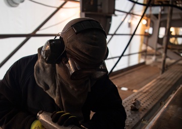 Sailor Conducts Corrosion Control