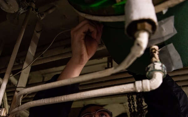 Sailor Applies Lagging