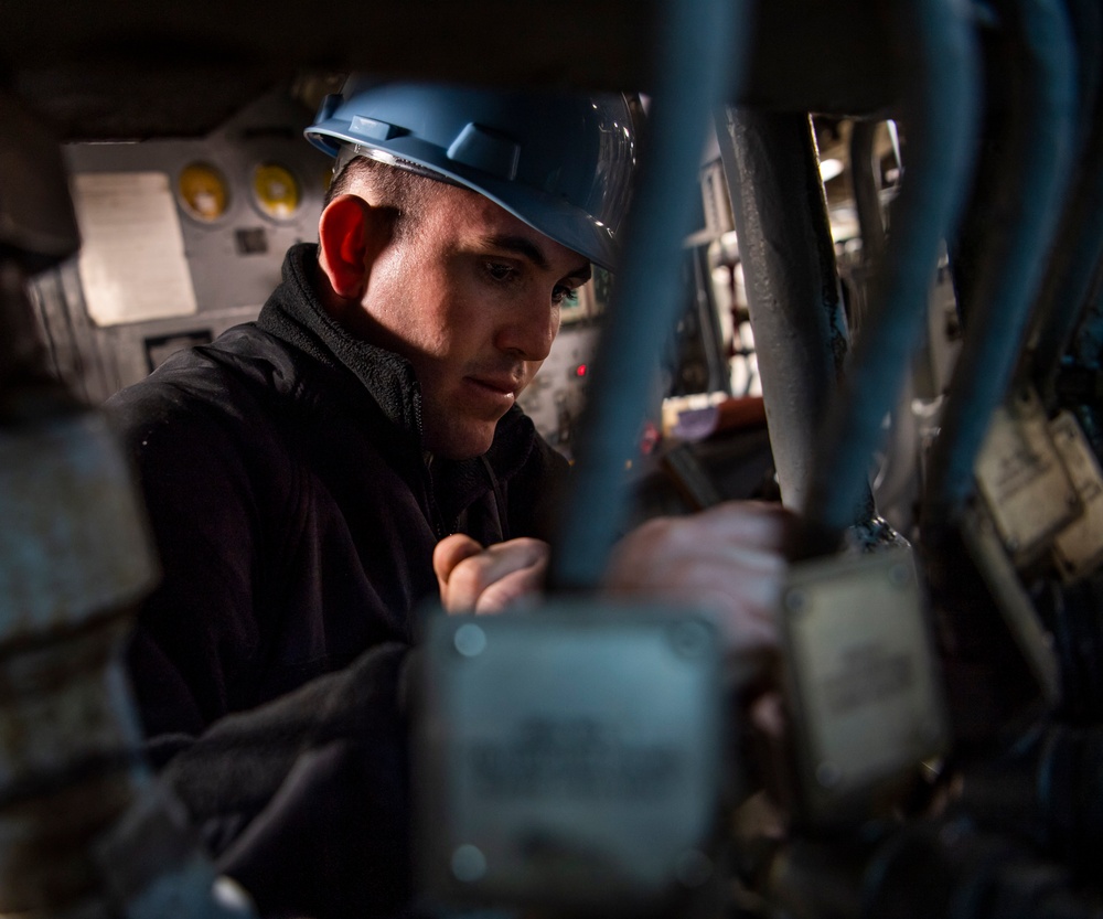 Sailor Conducts Corrosion Control