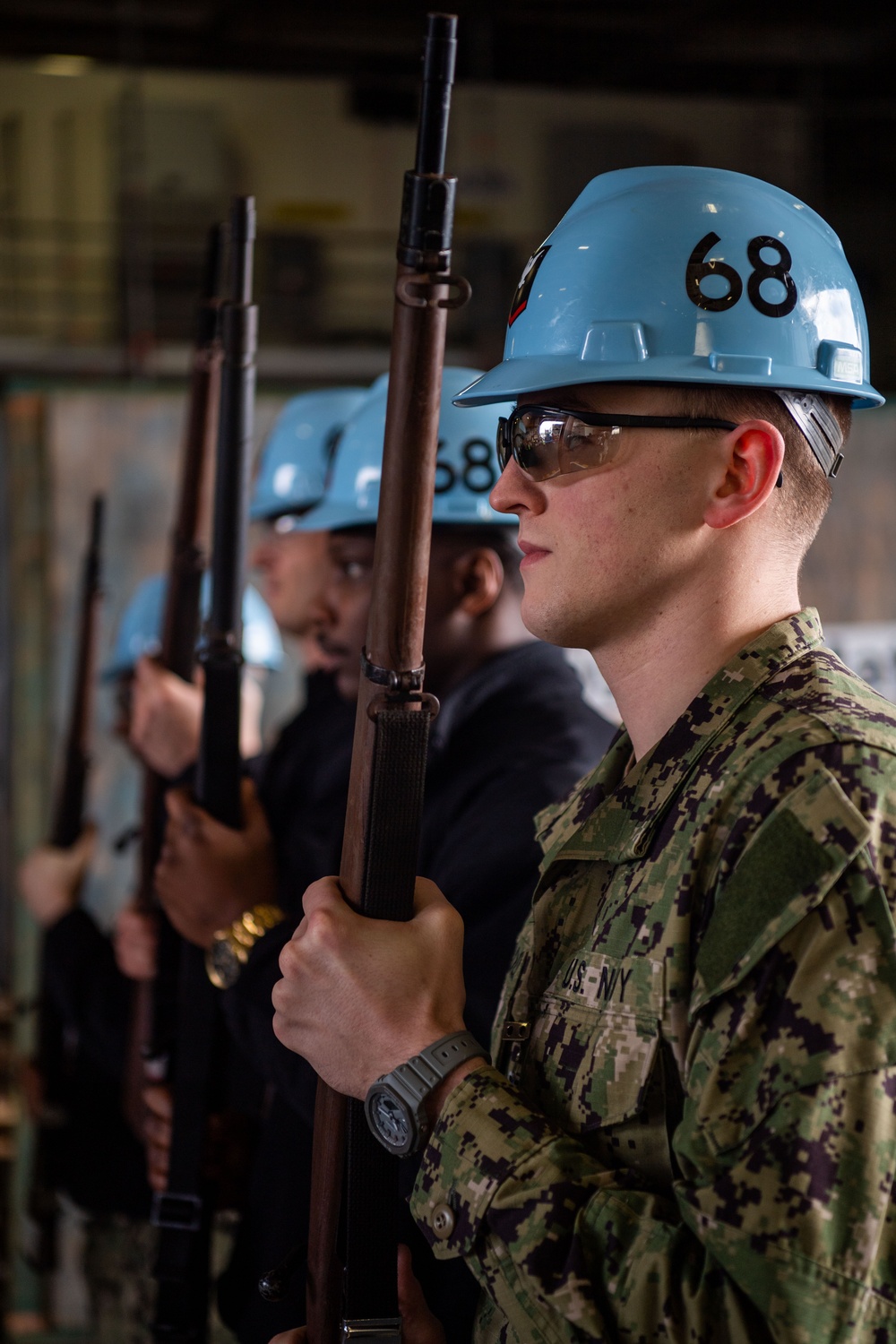 Sailors Practice Gun Drill