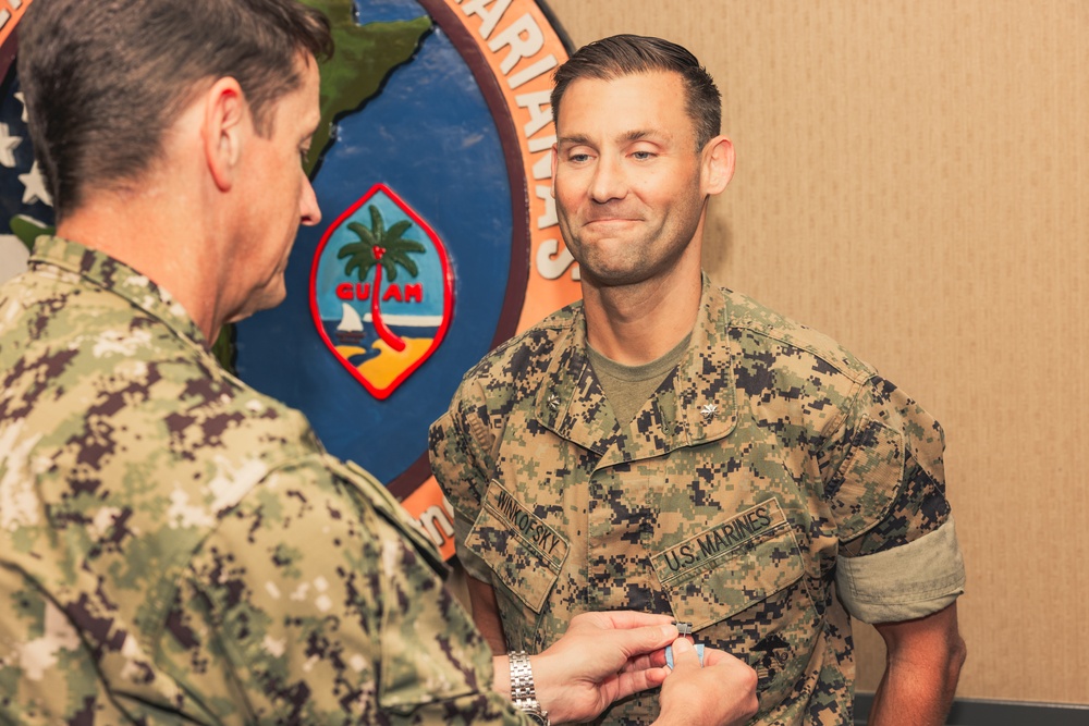 Rear Adm. Greg Huffman Awards Lt. Col. Winkofsky for Outstanding Service