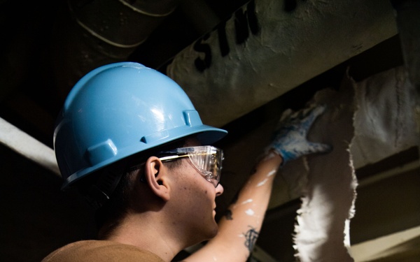 Sailor Applies Lagging