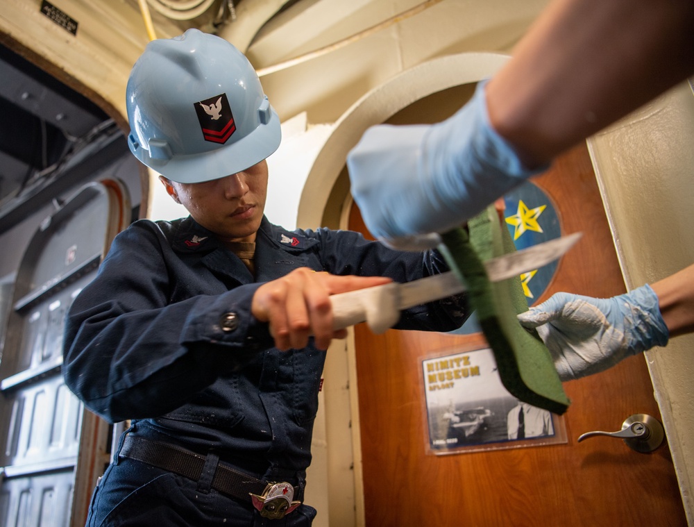 Sailor Prepares For Lagging