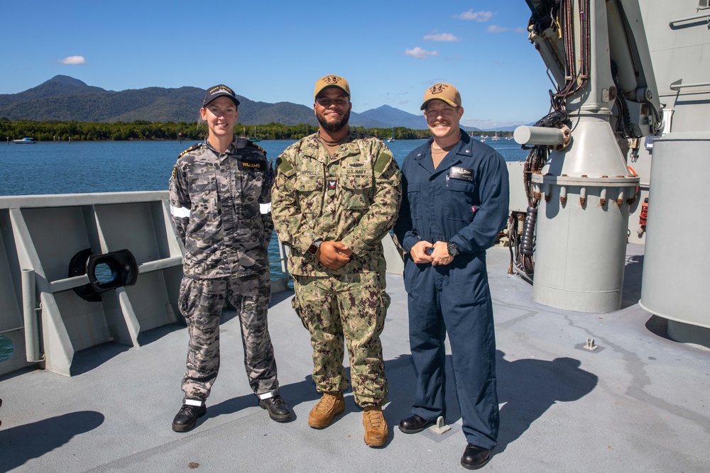 ESL Sailor Reenlist Aboard RAN Vessel