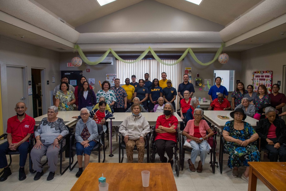 USS Ronald Reagan (CVN 76) Sailors participate in community relations event at Wusstig Adult Day Care Dementia Center during port visit to Guam