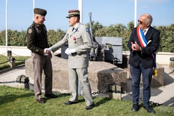 Maj. Gen. Todd R. Wasmund presents a Legion of Merit Medal [Image 5 of 11]